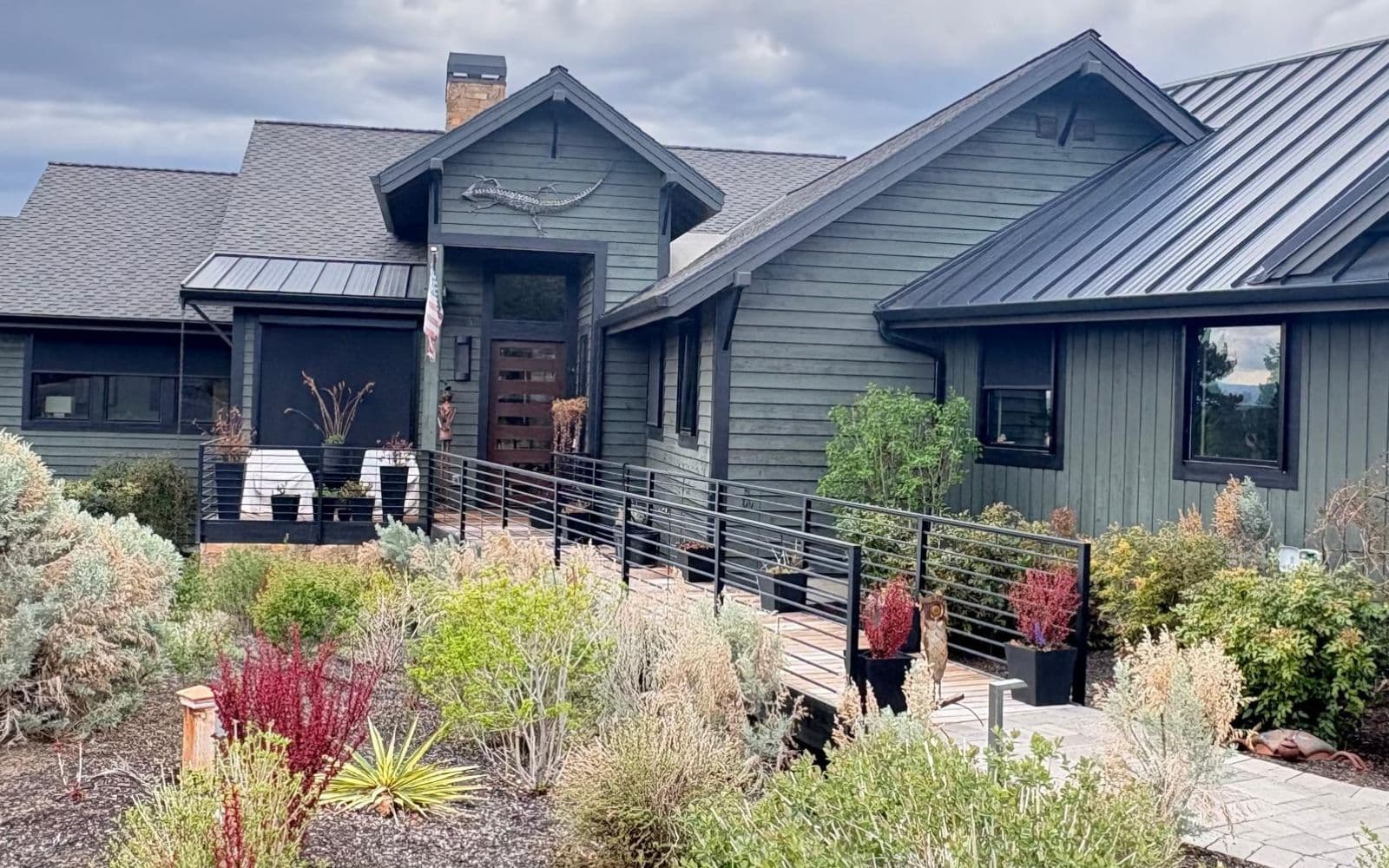Luxury Central Oregon home exterior with expansive, freshly cleaned windows